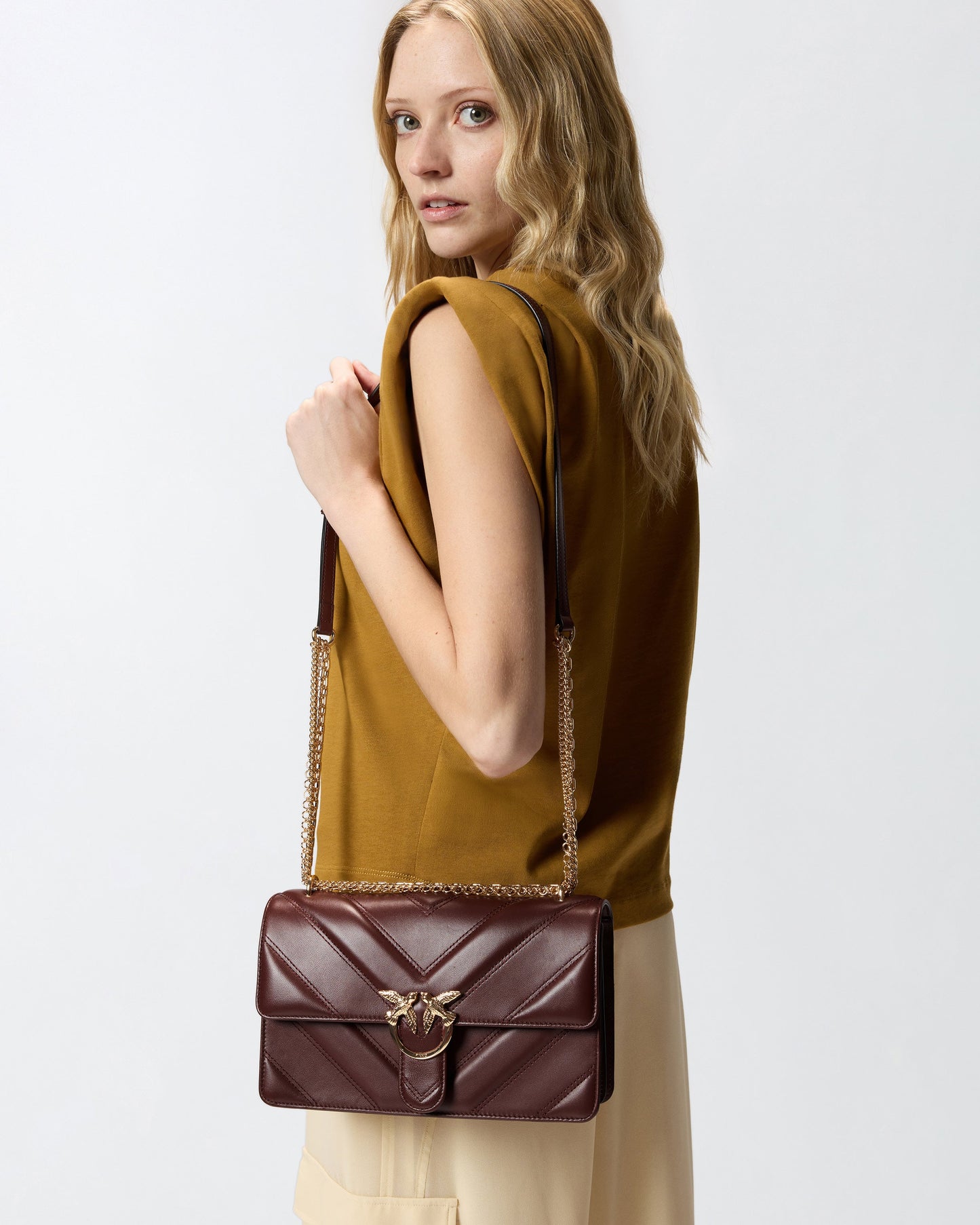 Love Bag One medium shoulder bag in chevron leather and nappa with triple chain