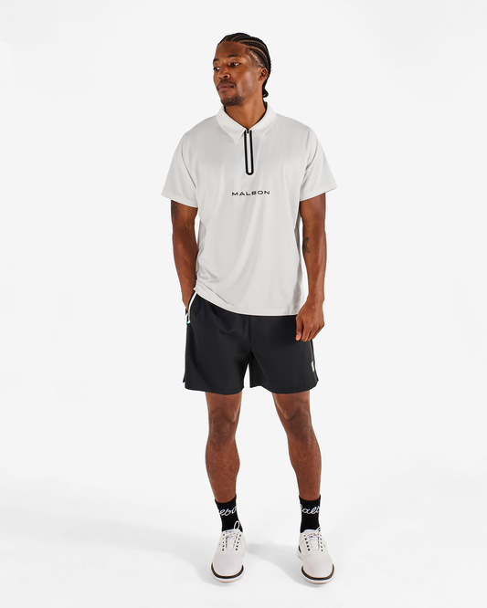 PERFORMANCE ZIP RAGLAN POLO