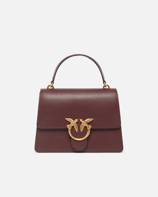 Medium handbag Love Bag Top Handle in leather