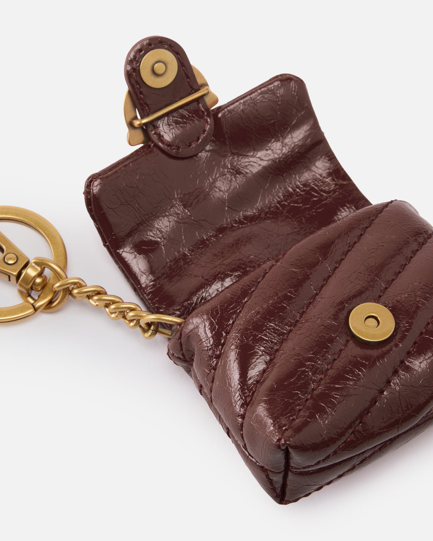 Love Bag Puff AirPods case in shiny leather