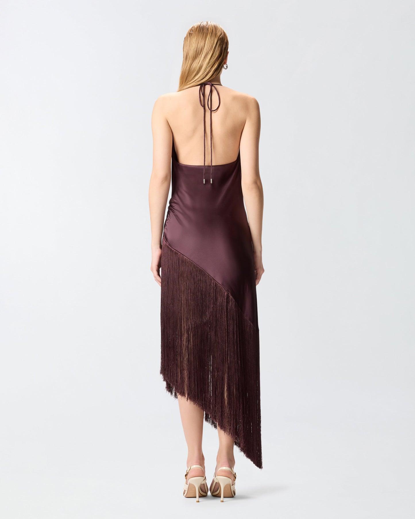 Asymmetrical top in satin with fringes