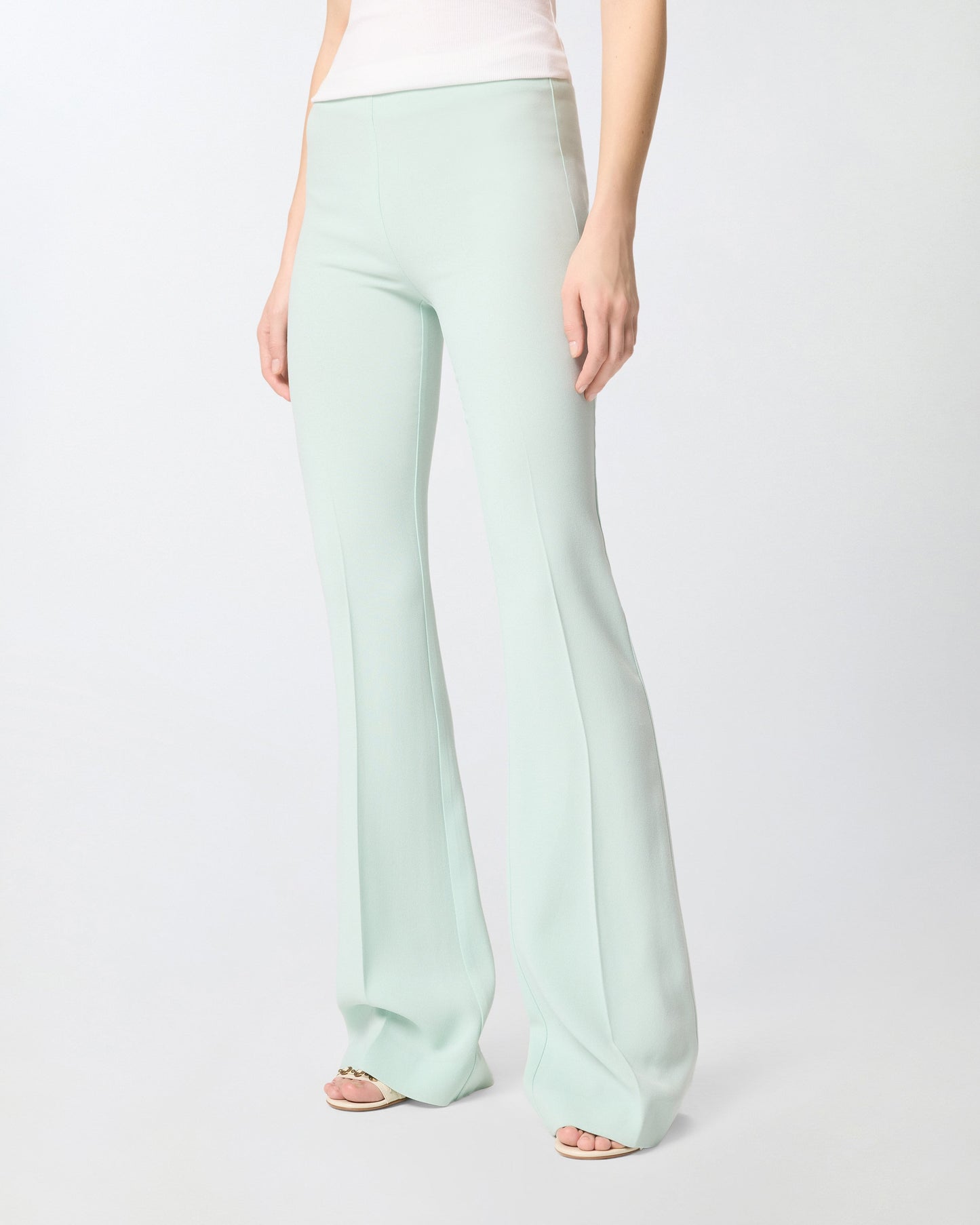 Flared trousers with pressed pleat detail