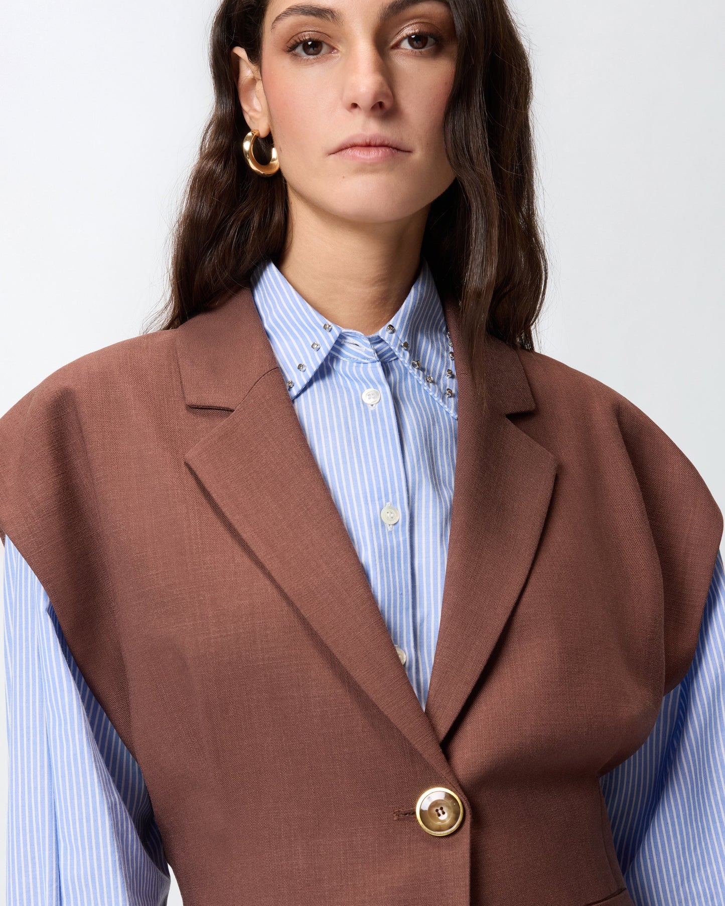 Sleeveless rustic-effect jacket