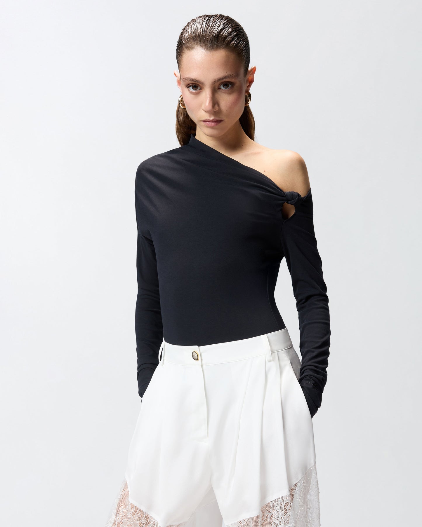 Bodysuit with asymmetric neckline