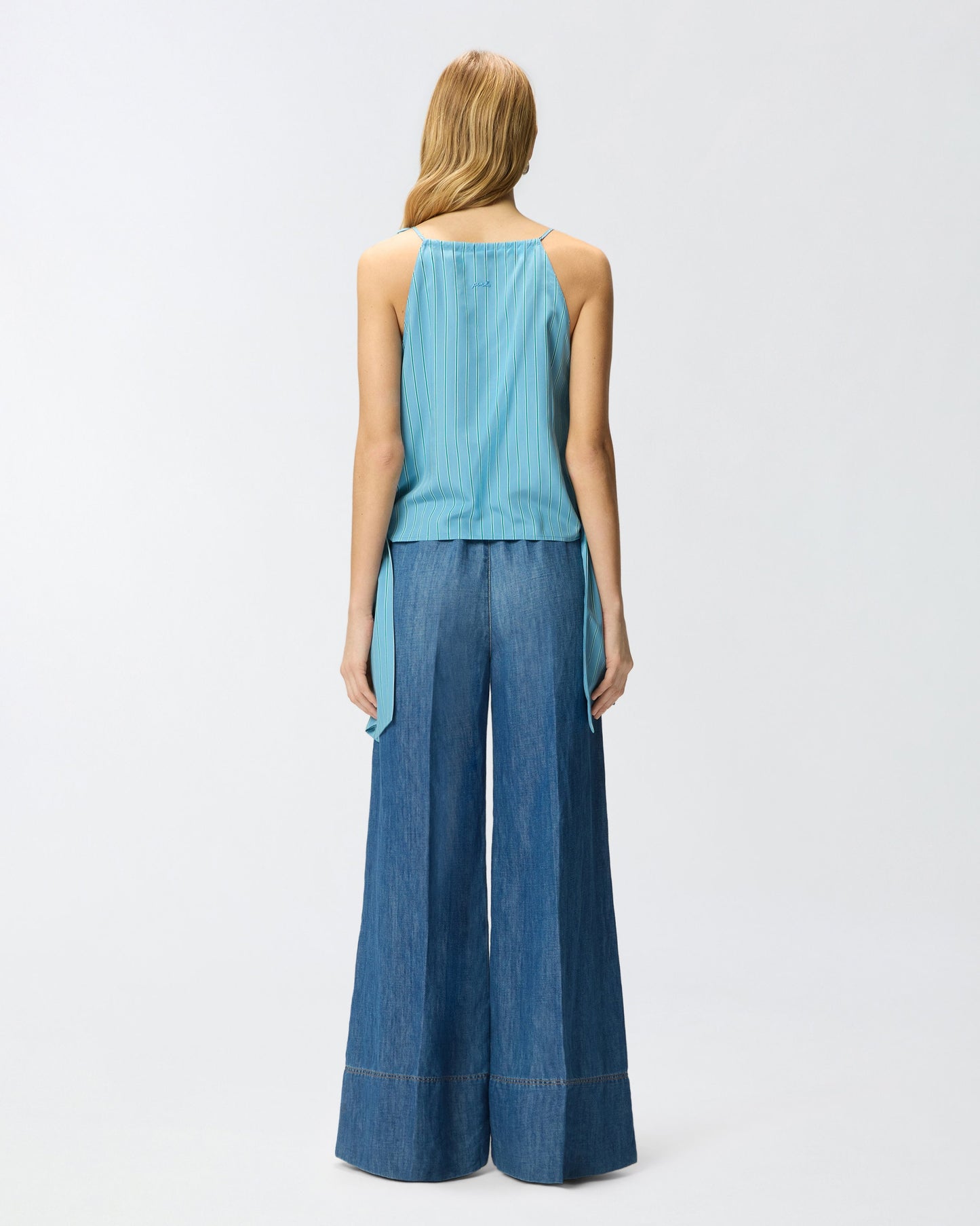 Striped top with thin shoulder straps and bows