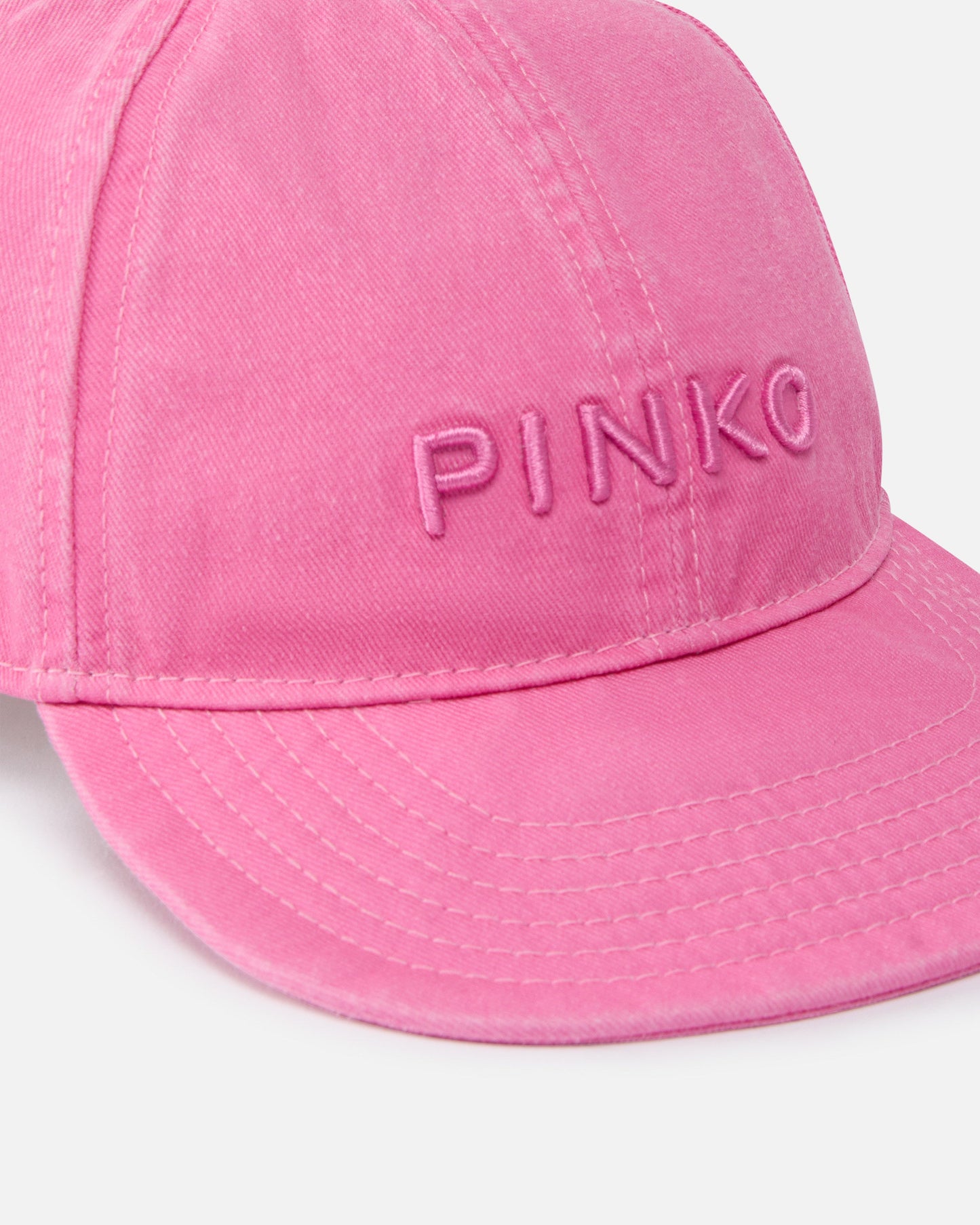 Cap with peak and fading