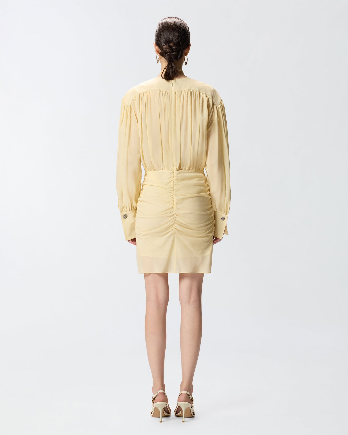 Mini dress with long sleeves and draping