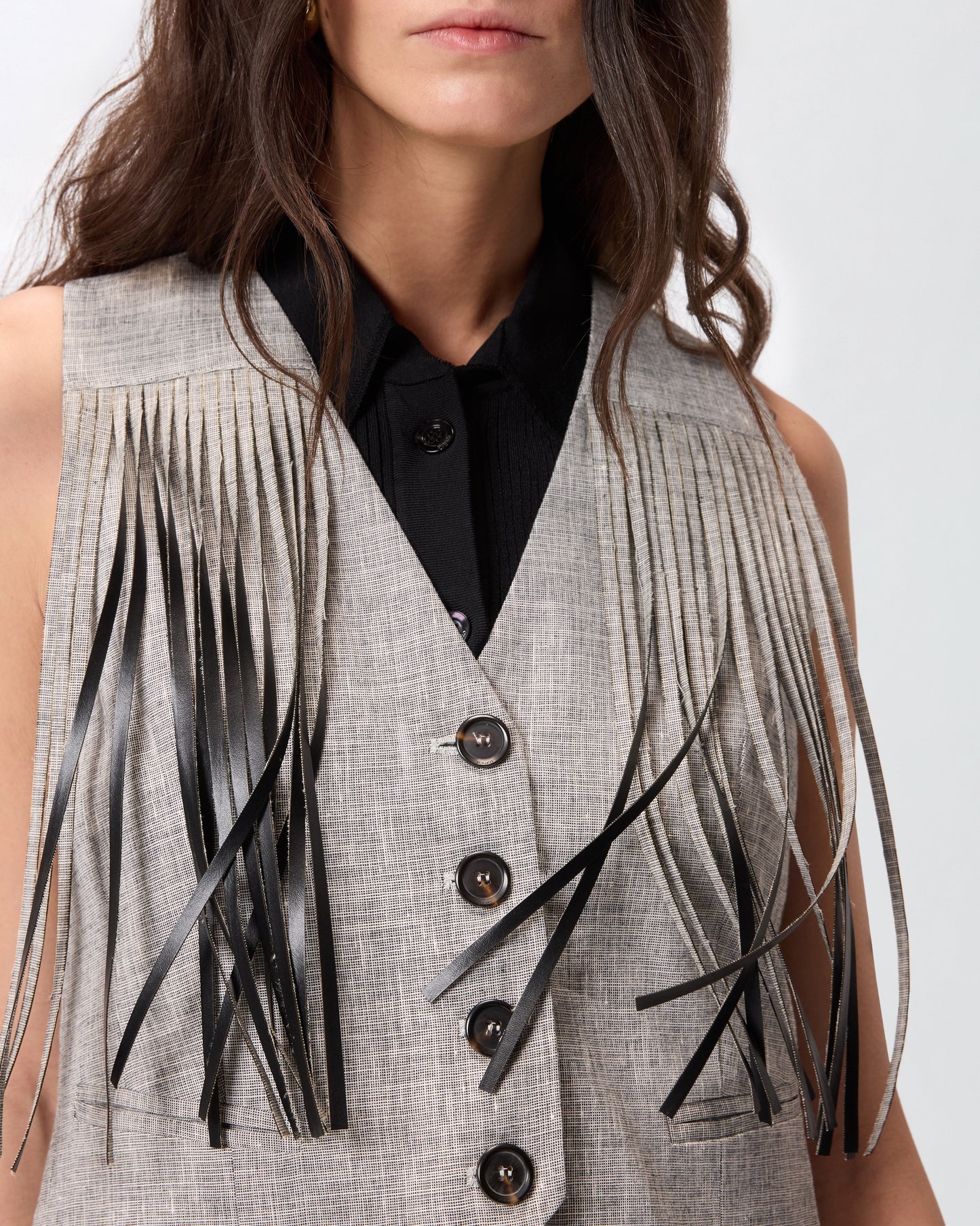 Vest with fringing