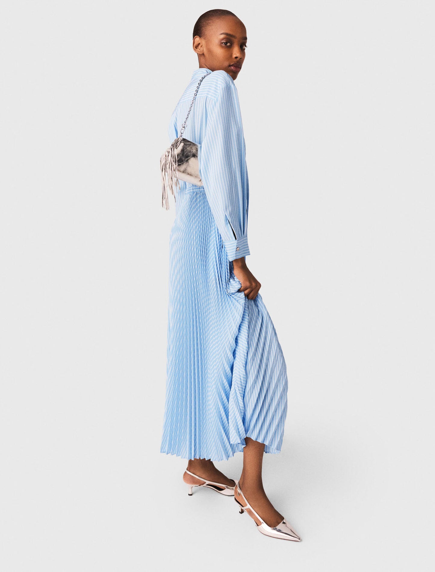 Long pleated dress with eyelets